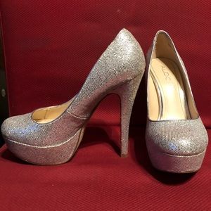 Aldo glittery platform pumps..